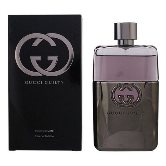 Men's Perfume Gucci EDT in a sleek bottle beside its elegant packaging, showcasing Gucci Guilty Homme fragrance.