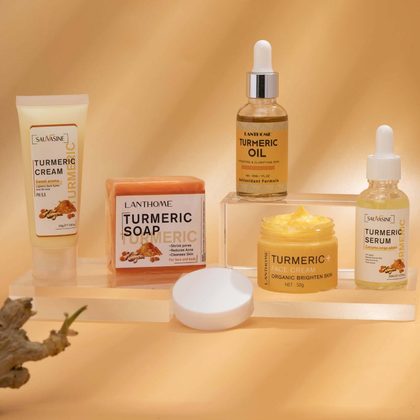 GlowRoot™ – 5-Piece Turmeric Skincare Kit for Radiant Skin displayed with turmeric cream, soap, oil, and serum.
