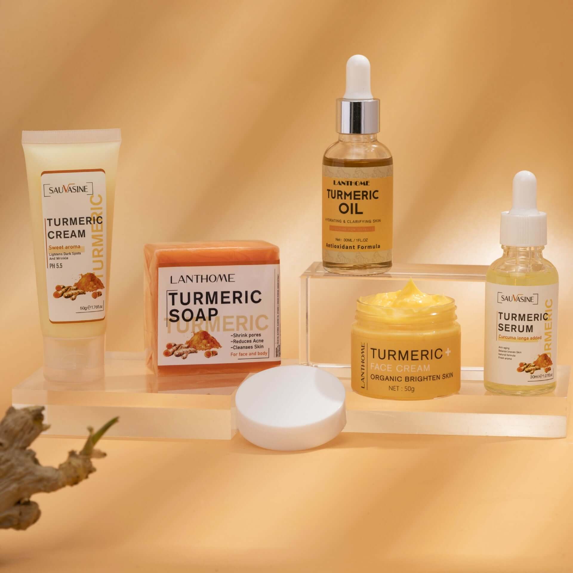 GlowRoot™ – 5-Piece Turmeric Skincare Kit for Radiant Skin displayed with turmeric cream, soap, oil, and serum.