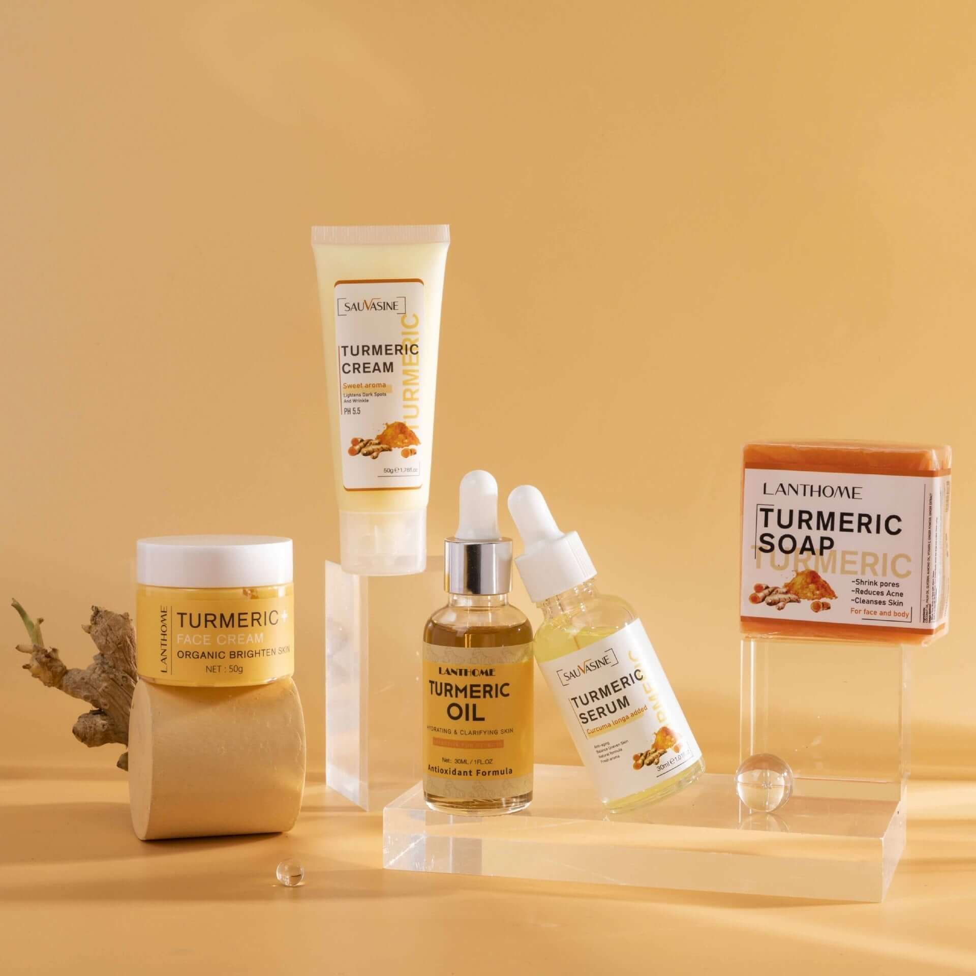 GlowRoot™ – 5-Piece Turmeric Skincare Kit for Radiant Skin displayed with cream, oil, serum, and soap.