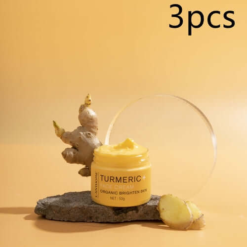 GlowRoot™ – 5-Piece Turmeric Skincare Kit for Radiant Skin on a stone with turmeric root background.