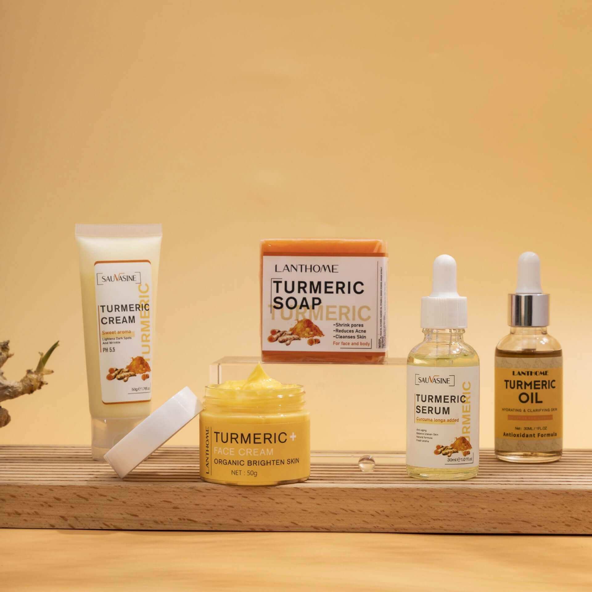 GlowRoot™ – 5-Piece Turmeric Skincare Kit for Radiant Skin with turmeric cream, soap, serum, and oil.