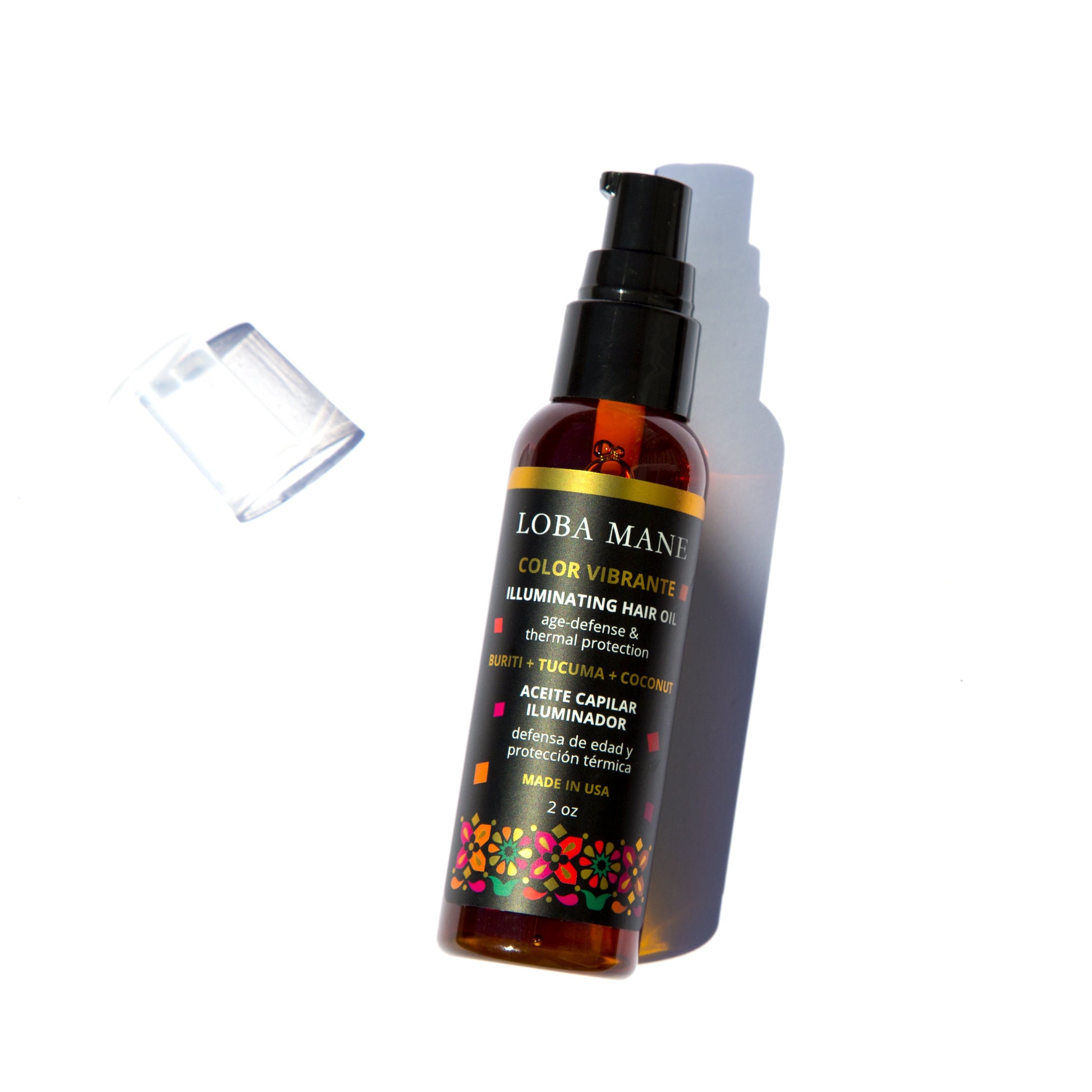 The Illuminating Oil bottle on a white background, designed to rejuvenate hair and provide deep moisture retention.