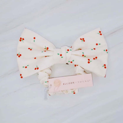 Cherry Lovely Bow Tie Hair Scrunch with cherry print and charming bow tie detail.