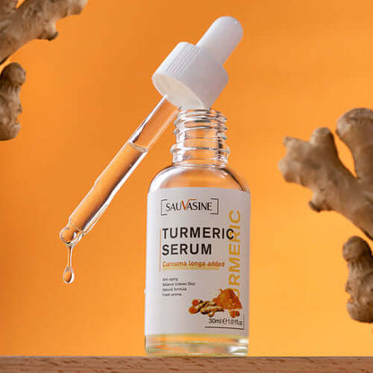 GlowRoot™ – 5-Piece Turmeric Skincare Kit for Radiant Skin, featuring turmeric serum in dropper bottle.